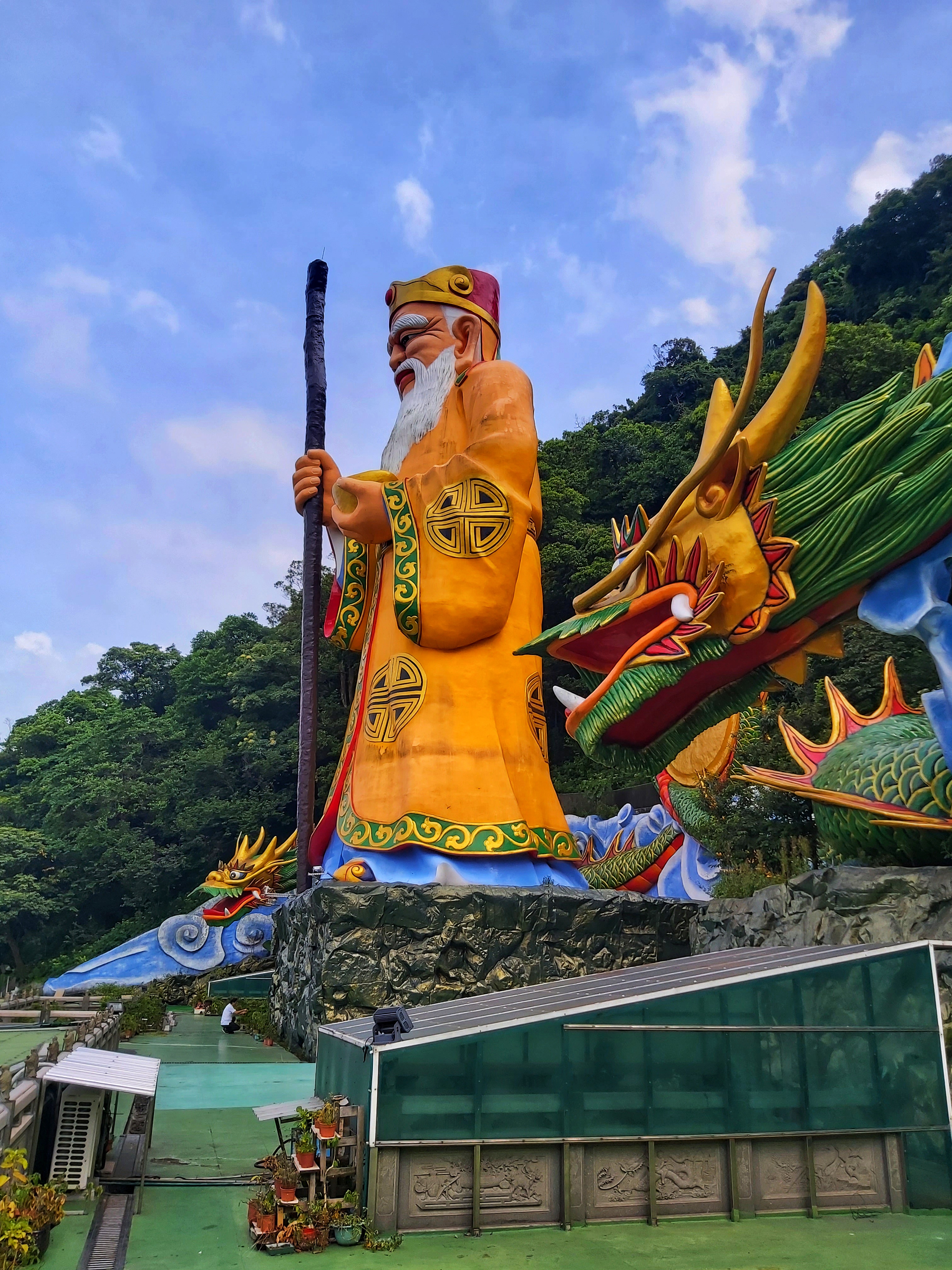 a colossal statue of the God of Earth and Money (土地公)