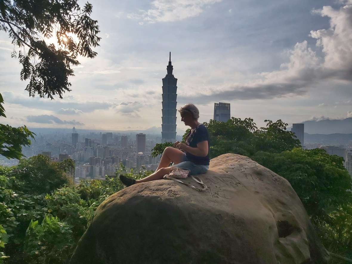 Person taking a picture on elephant mountain taipei